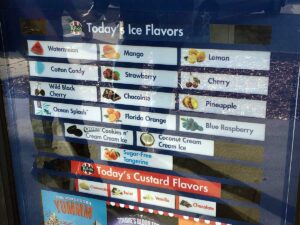 The menu options, including the Italian ice flavors and custards.